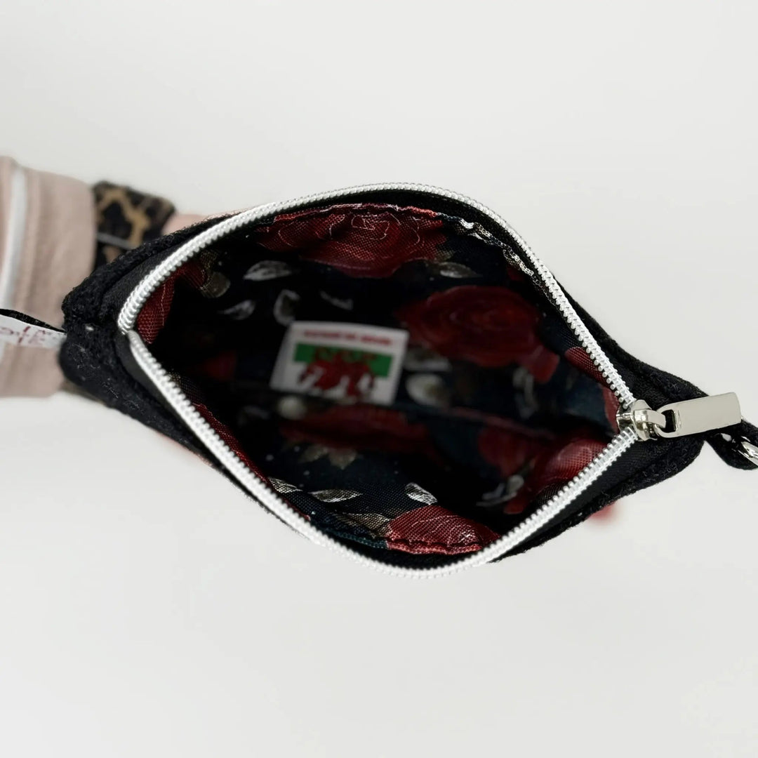 Water-resistant Rosa print lining inside black Harris Tweed pouch, Heritage Collection by Emma Easter