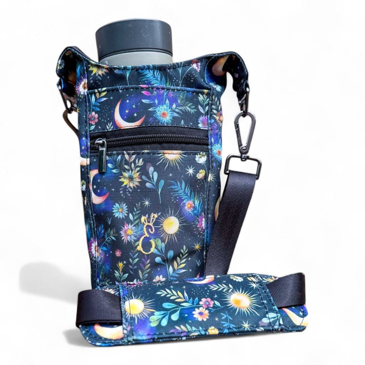 Handmade celestial water bottle bag with moon and star print, black strap, waterproof lining, made in Wales