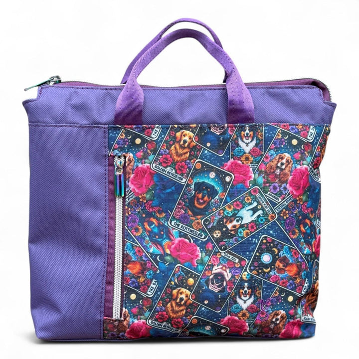 Dogs of Tarot backpack featuring vibrant dog tarot card illustrations with purple canvas, handmade and water-resistant