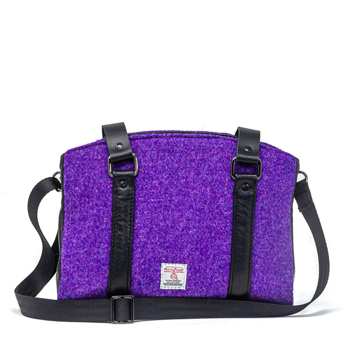 Rowena purple Harris Tweed® handbag styled with black leather, handcrafted in Wales by Emma Easter Handcrafted – lifestyle view.