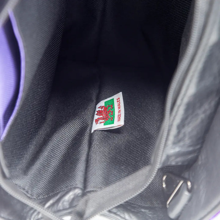 Interior of the Rowena handbag showing made in Wales label and water-resistant lining, crafted by Emma Easter Handcrafted in Wales.