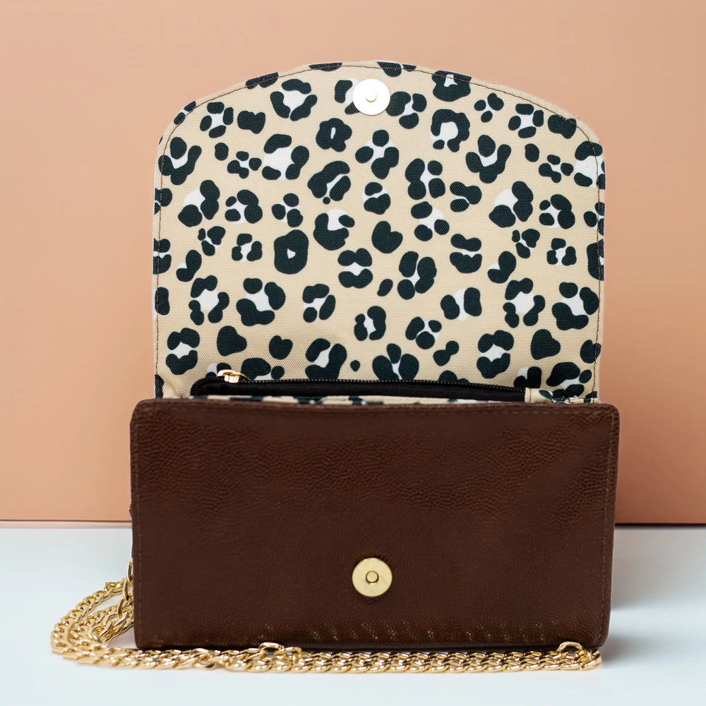 Leopard print bag with a brown textured leather base with removable gold chain strap made in Wales and handcrafted by Emma Easter Handcrafted