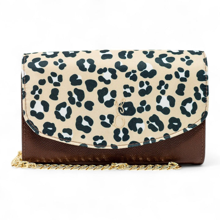 Leopard Luxe leather handbag with beige and black animal print flap, brown pebbled leather body, and gold chain strap.