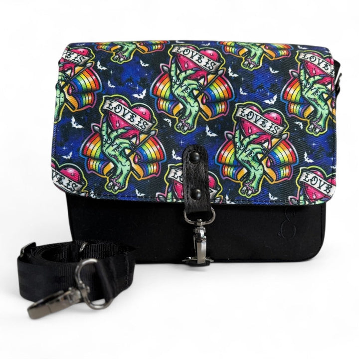 Love Is Love oilskin vegan crossbody bag featuring custom printed water-resistant canvas with organic dry oilskin, handcrafted in Wales