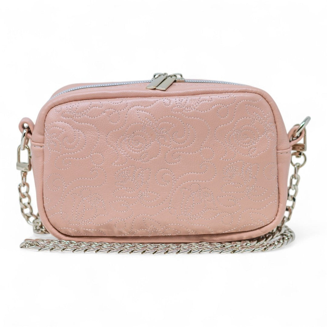 Mini handbag in pearlised pink Italian Nappa leather with embossed rose detail and silver chain strap, handmade in Wales.