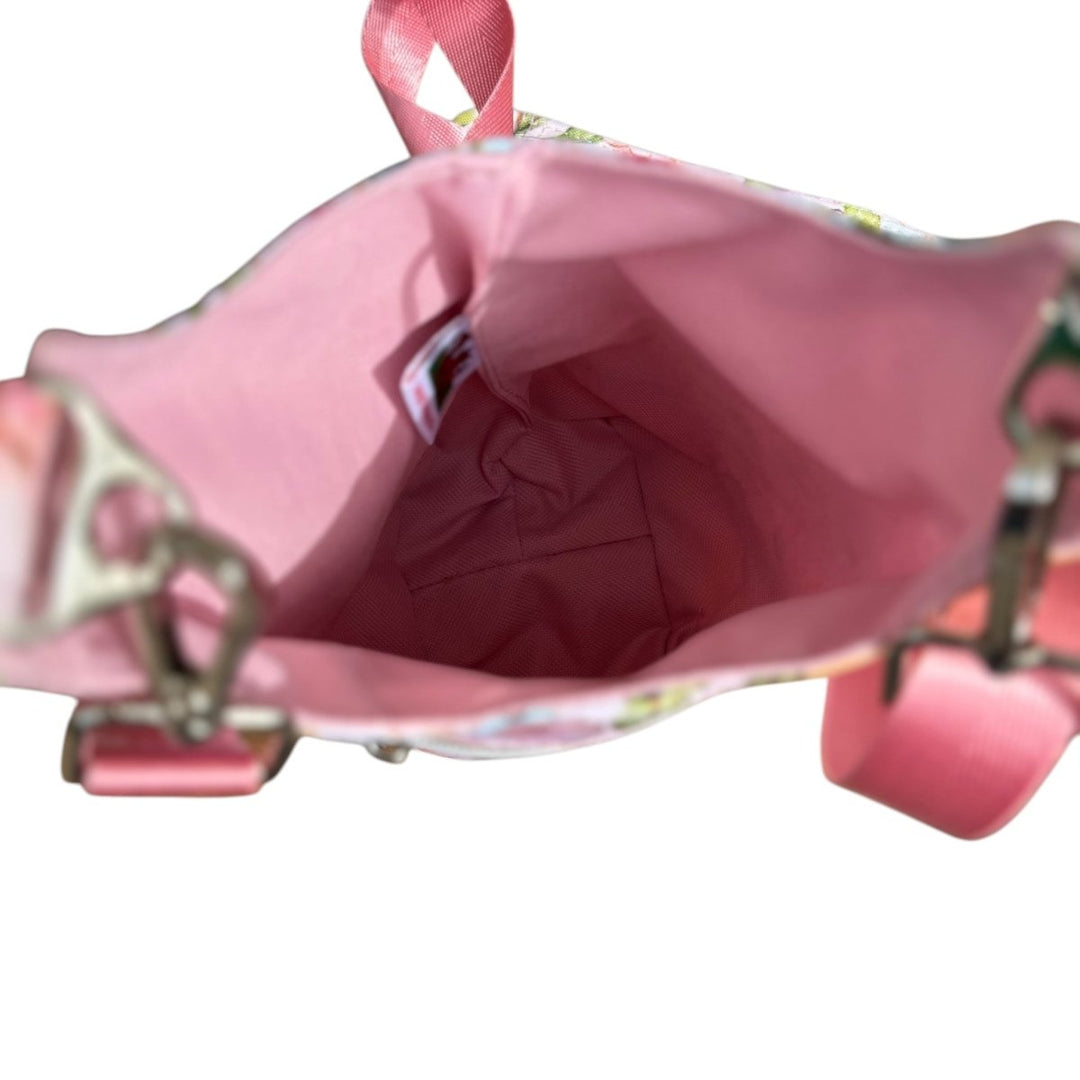 Inside view of the Penelope Bottle Buddy featuring pink waterproof canvas lining.