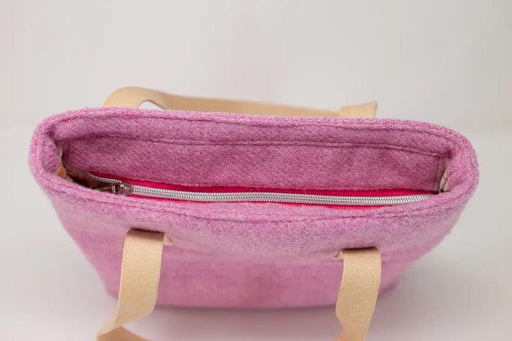 Top view of the Penelope Harris Tweed pink tote bag showing zip closure by Emma Easter