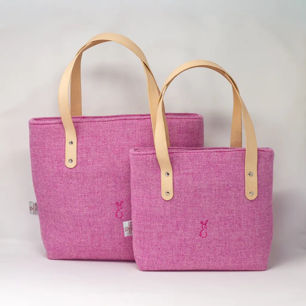 Set of two Penelope Harris Tweed pink tote bags in small and large sizes, with natural leather handles by Emma Easter Handcrafted