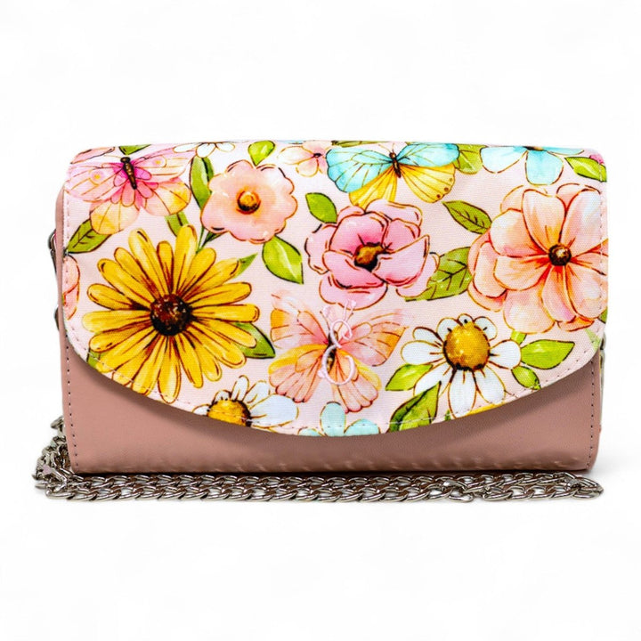 Penelope handcrafted leather mini handbag featuring vibrant watercolour florals and butterflies, designed for weddings, events, or summer outings. Made in Wales.