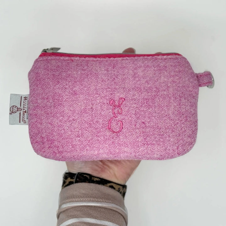 Pink Harris Tweed® Cloth pouch by Emma Easter Handcrafted held by a hand on a white background