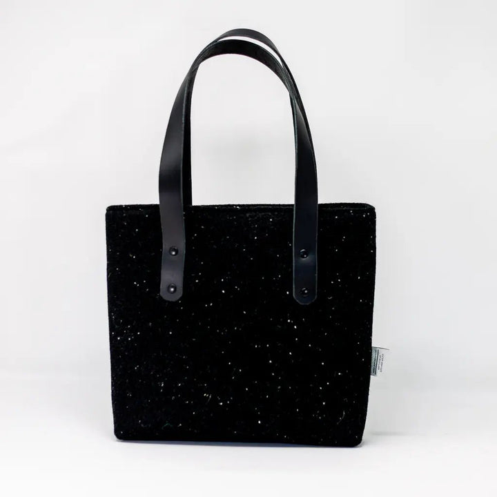 Alternative back view of the black Harris Tweed tote bag with black leather straps Emma Easter Handcrafted.