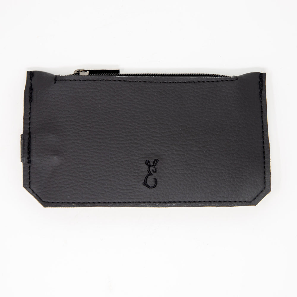 Back of black slim purse showing embroidered logo and zipped pocket section