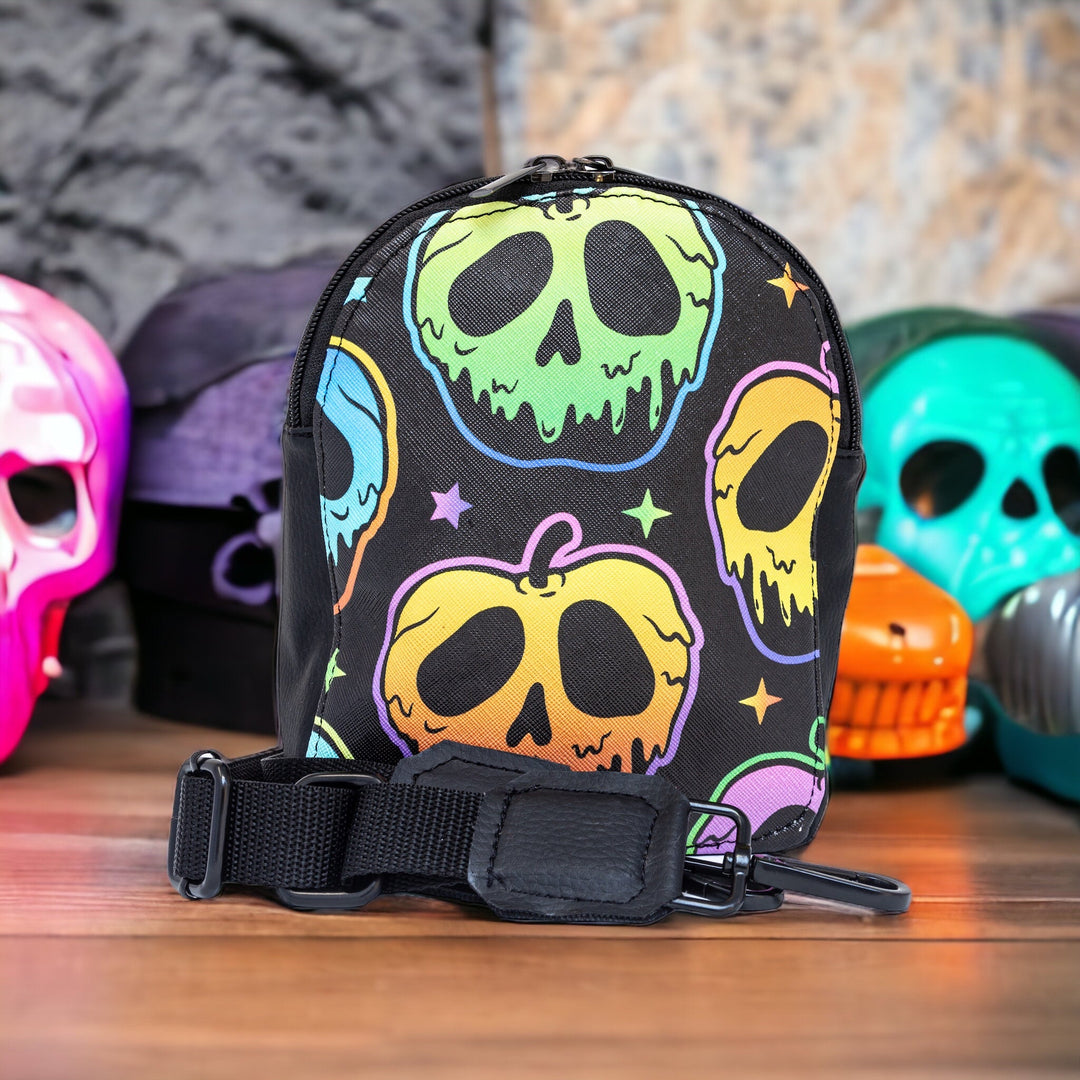 Spooky Apples Mini Sling Bag with colourful ceramic skulls in the background - Emma Easter Handcrafted